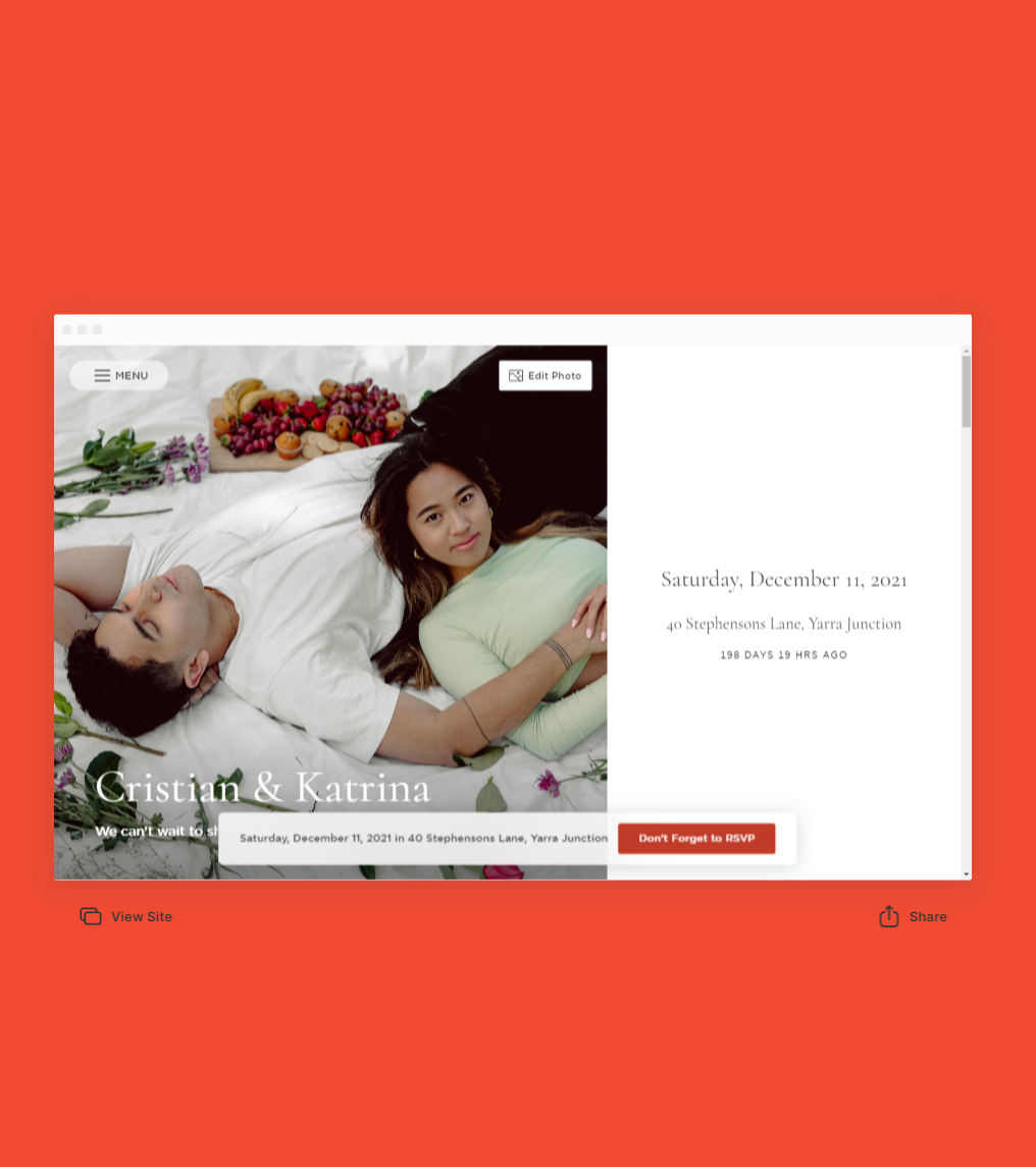 Screen capture of the front page of a wedding website, the couple is laying on a picnic blanket and smiling together with some fruits and snacks on a platter behind them