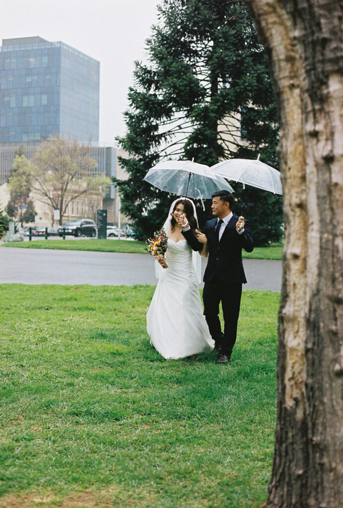 Fitzroy Gardens Intimate Wedding, Karaoke Reception, old band stand, 35mm film, waling down the aisle