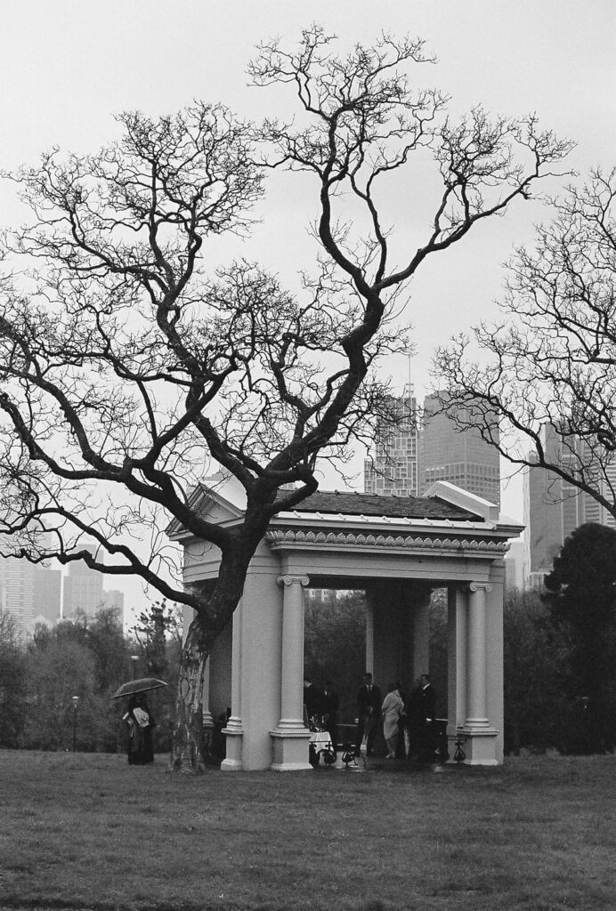 Fitzroy Gardens Intimate Wedding, Karaoke Reception, old band stand, 35mm film, black and white