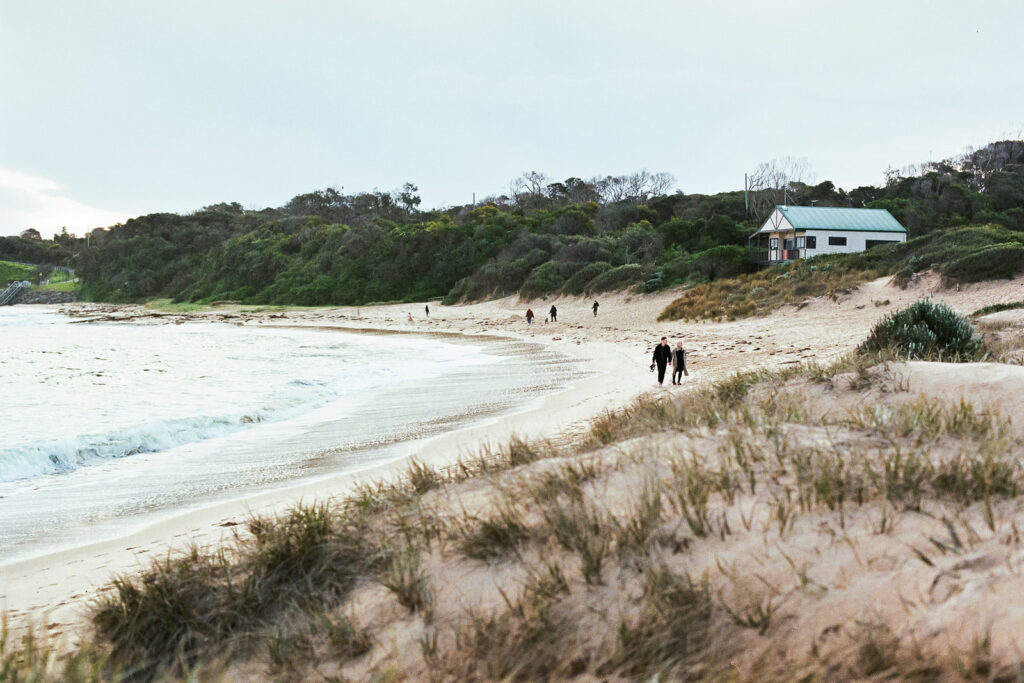 proposal picnic at the beach ideas and inspiration, sentimental with photos, candles, flowers a letter and fairy lights -2