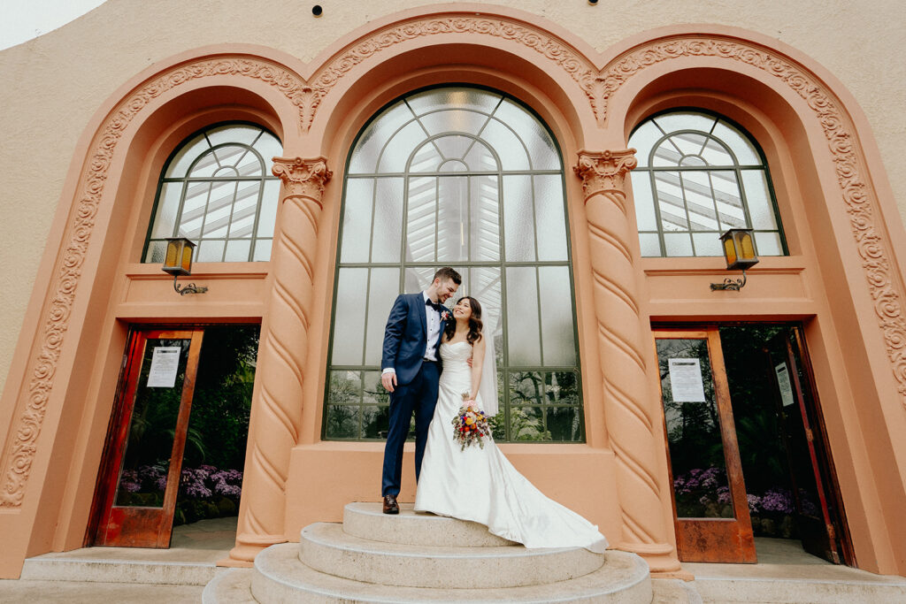 Fitzroy Gardens Intimate Wedding, Karaoke Reception, conservatory, silk dress, blue suit