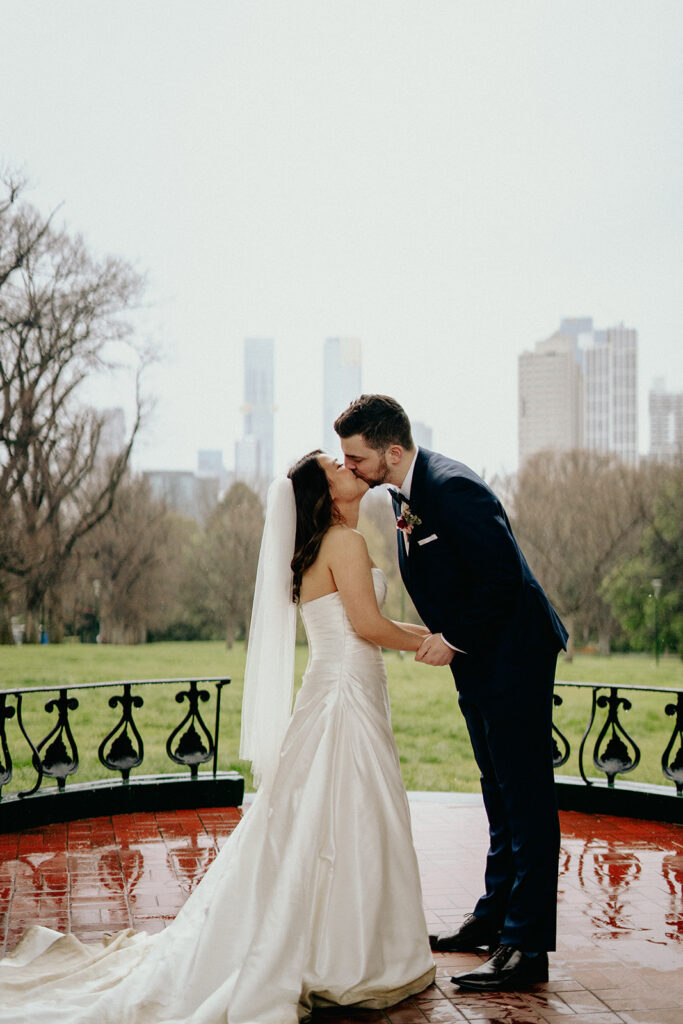 Fitzroy Gardens Intimate Wedding, Karaoke Reception, old band stand, silk wedding dress, blue suit, private dance, rainy wedding day, melbourne city wedding - 3