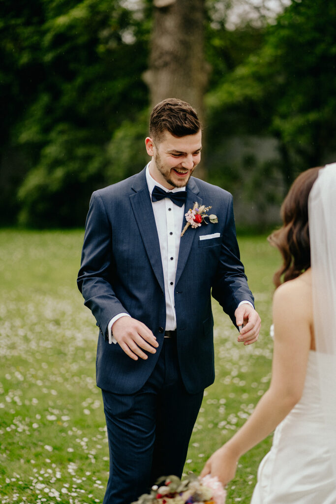 Fitzroy Gardens Intimate Wedding, Karaoke Reception, first look grooms reaction, blue suit, red wedding flowers