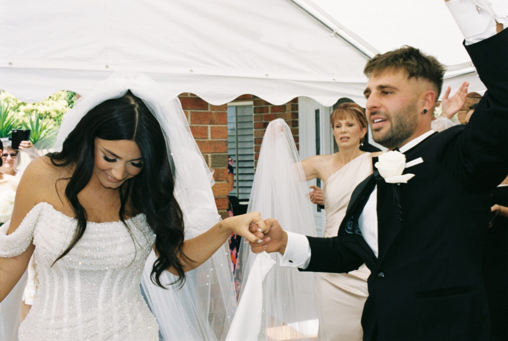 Monika & Kristian's traditional Croatian wedding at the wedding venue Carousel Albert Park, on 35mm film