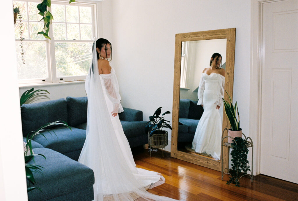 Wedding dress hand made by stephanie's Aunt on her wedding day at emu bottom estate, captured on 35mm film