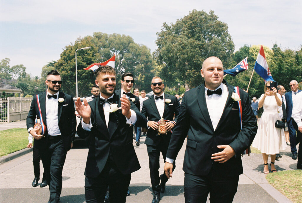 Monika & Kristian's traditional Croatian wedding at the wedding venue Carousel Albert Park, on 35mm film