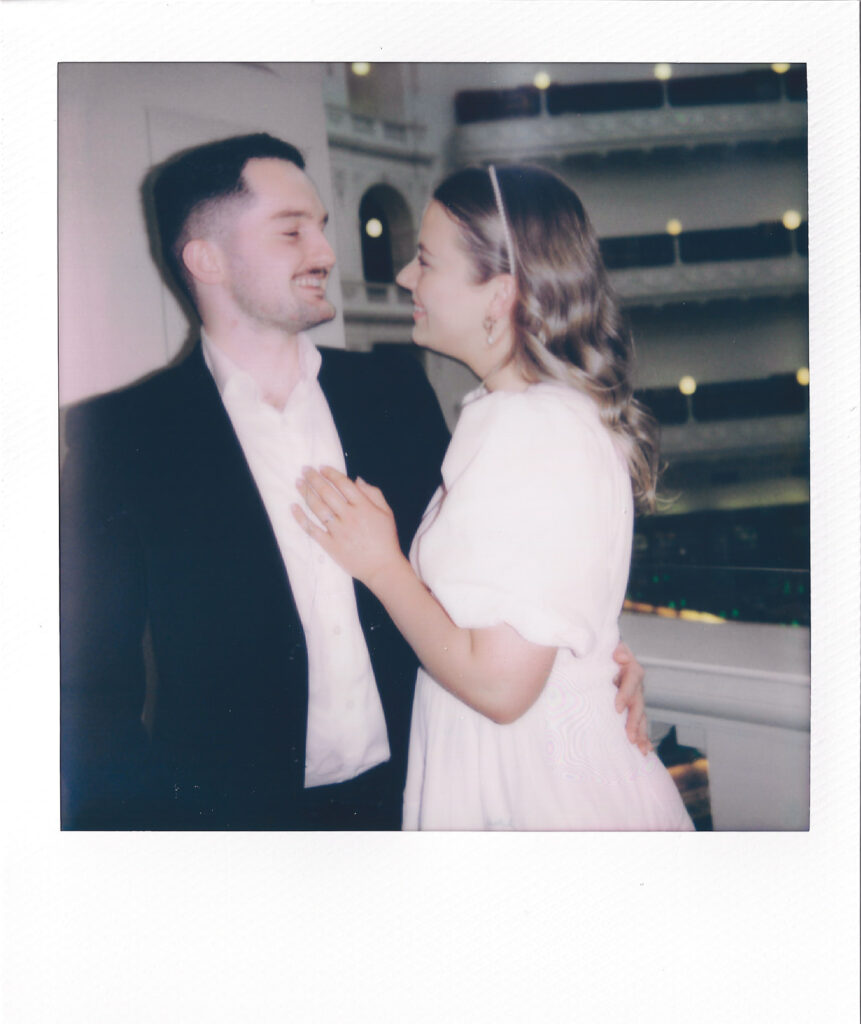 couple hugging on the balcony of the state library