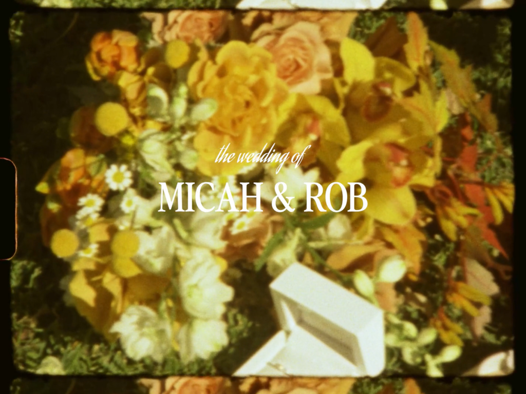 Snippet of a super 8 video, the wedding of Micah and Rob is titled and footage of the flowers are in the background