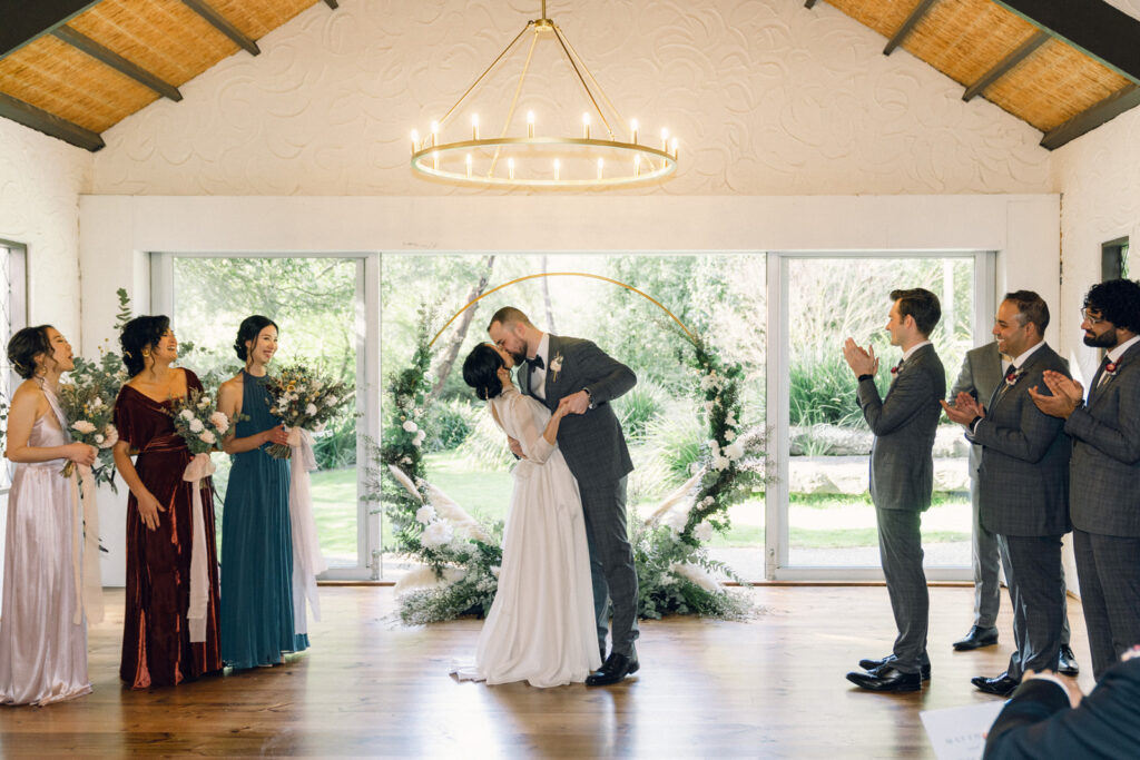 first kiss as husband and wife at potters receptions chapel