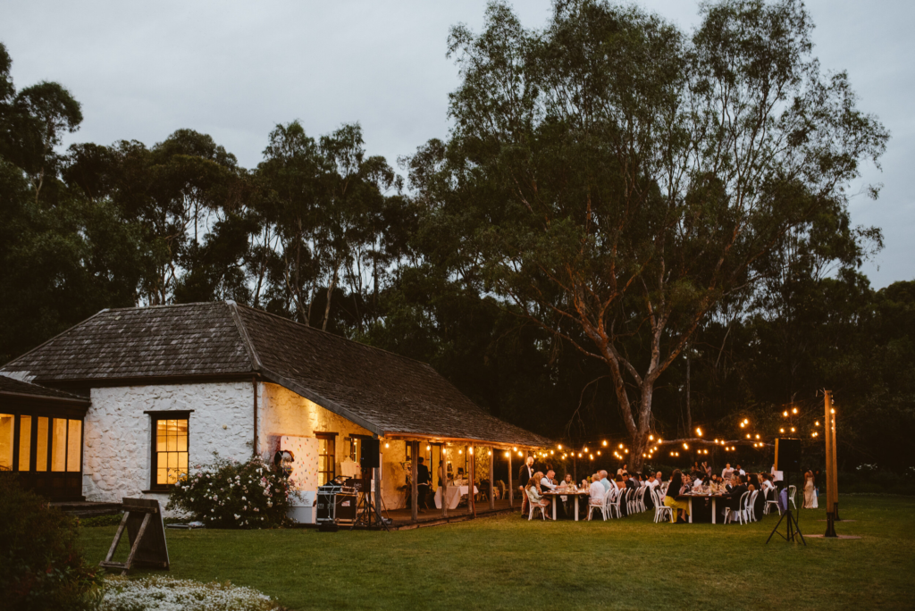 emu bottom homestead at night during a wedding reception with tungsten lighting