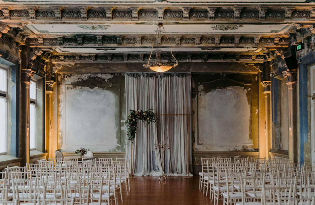 a ceremony setup in george ballroom, a vintage inspired wedding venue