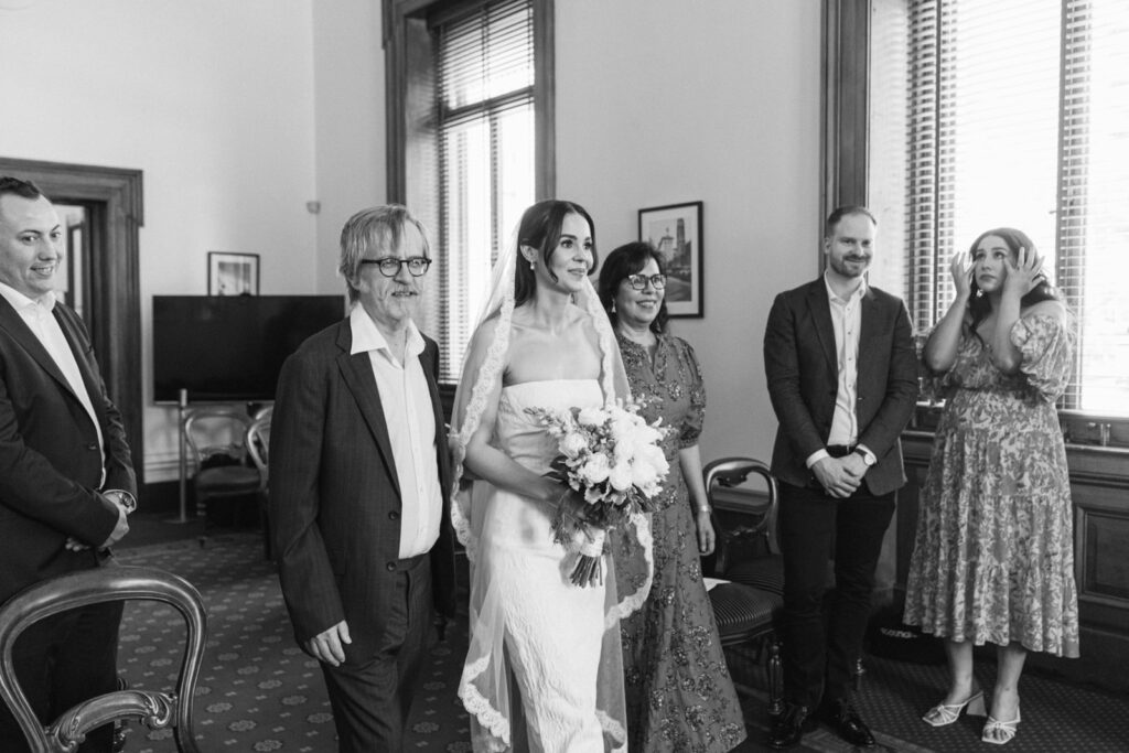 bride walking down the aisle at the victorian marriage registry