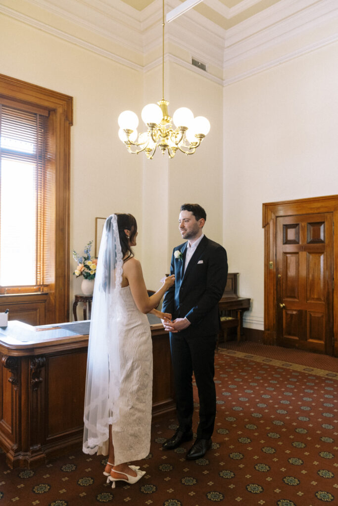 photo of bride during her vows at the marriage registry building