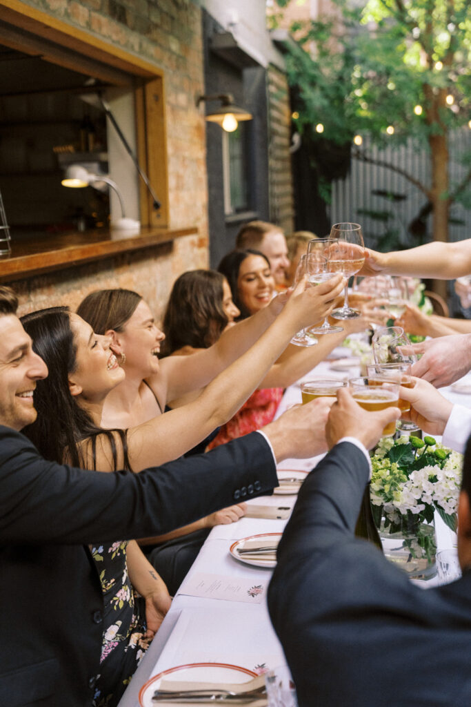 wedding guests cheers glasses of wine